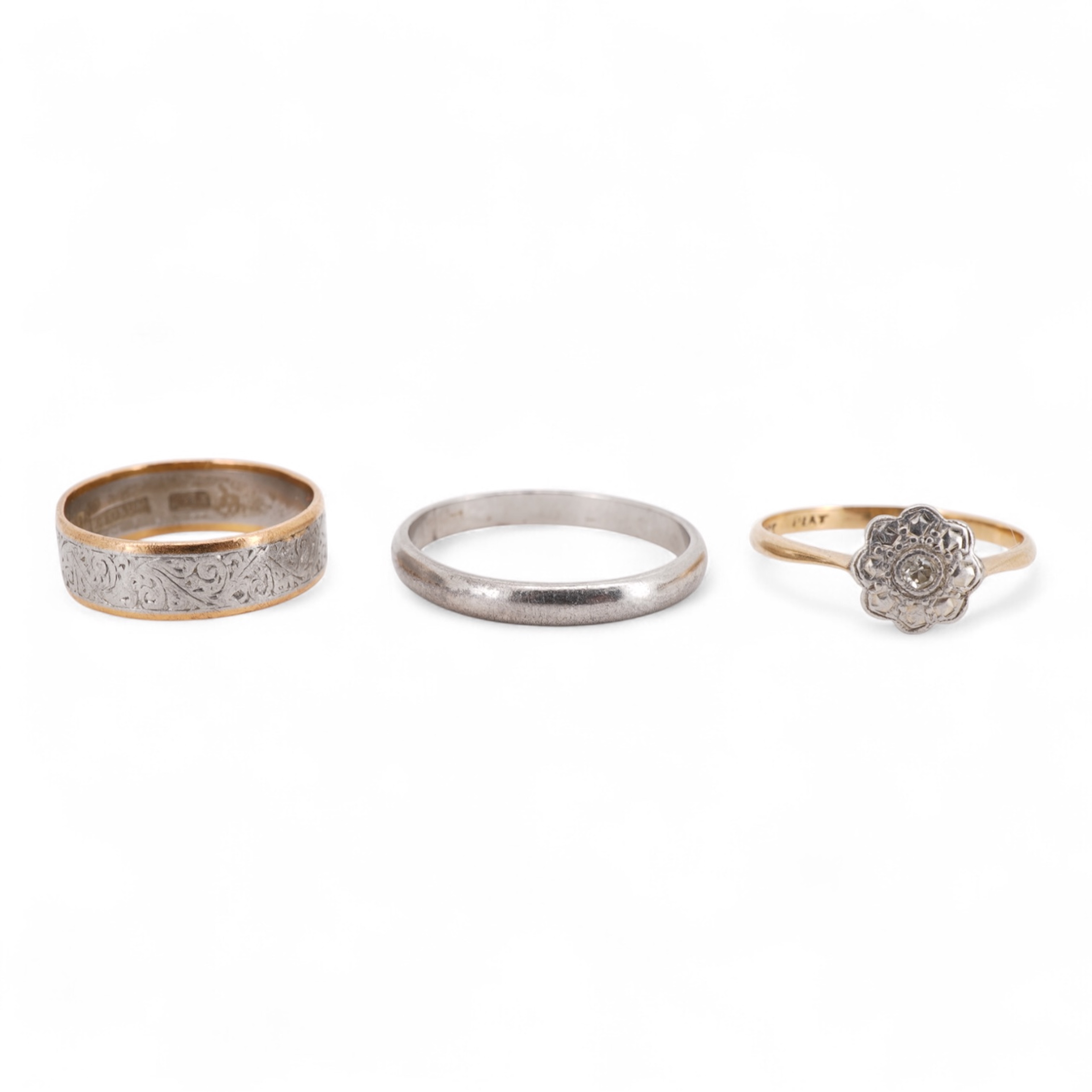 Three rings, comprising: a platinum wedding band, size N1/2, stamped PLAT, gross weight 3 grams; a bicoloured band, size J, stamped PLATINUM 22CT, gross weight 3 grams; and a ring set with a diamond weighing approximatel